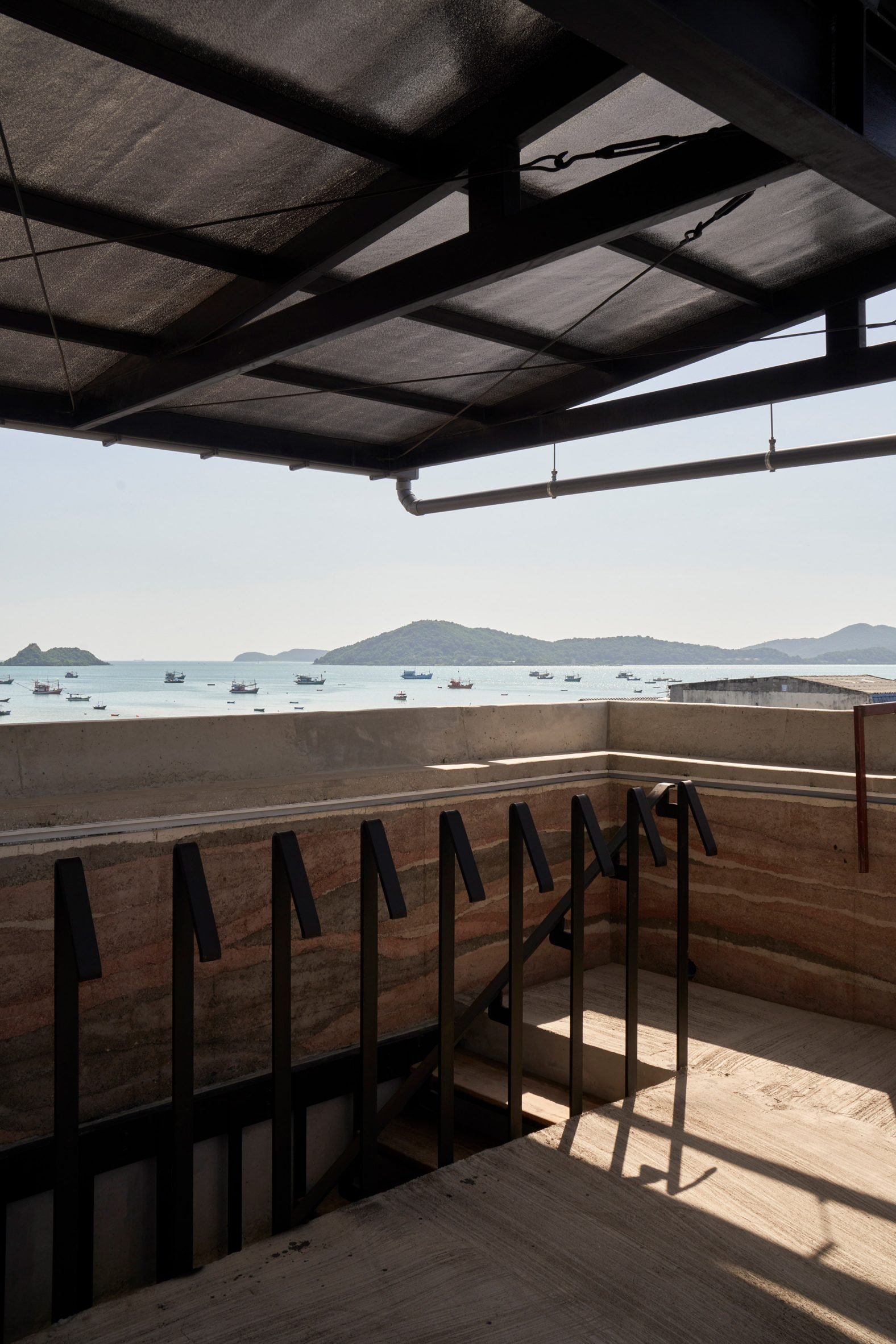 Roof terrace at rammed-earth Chonburi Multi-Purpose Building
