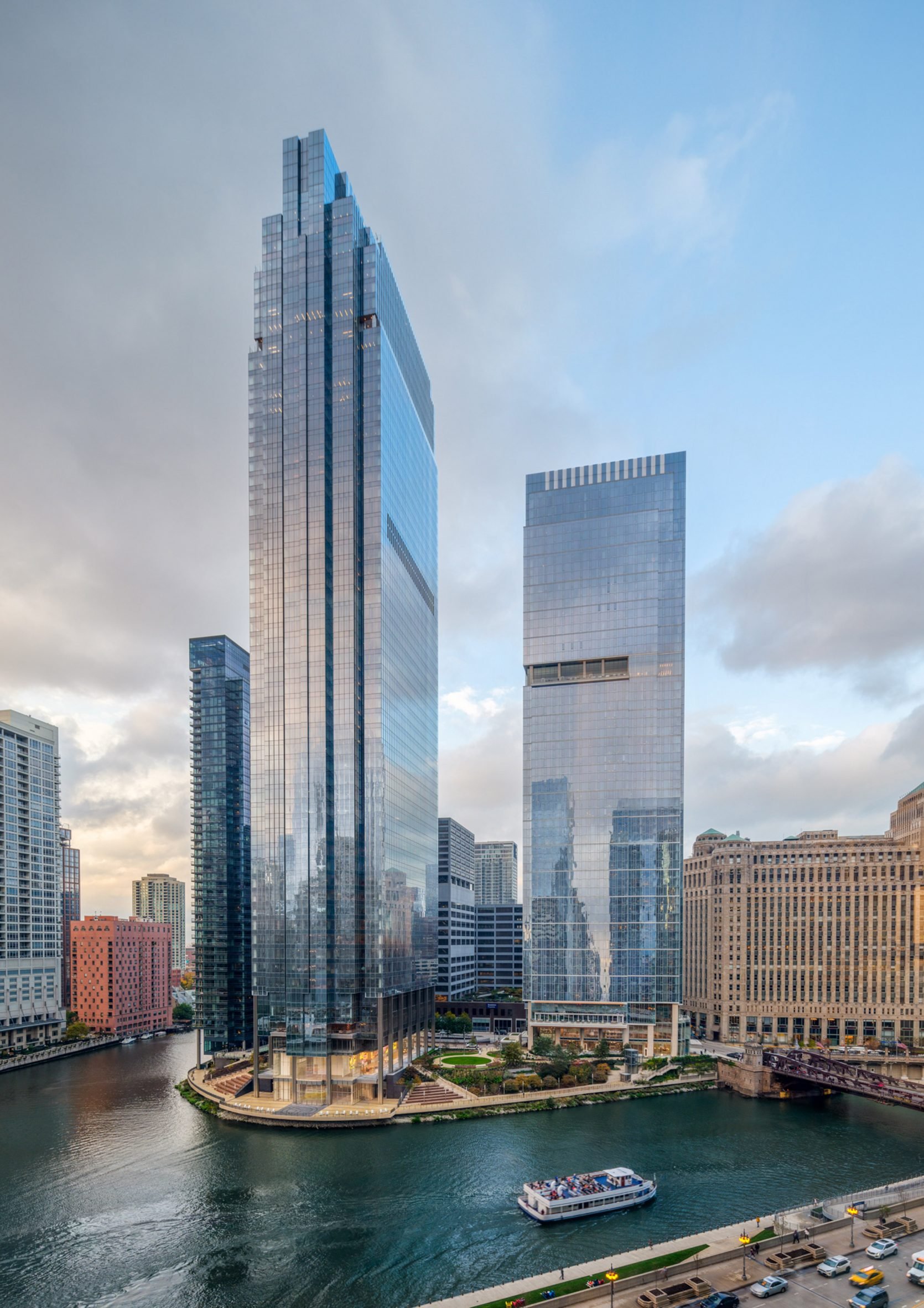 Two glass towers along river