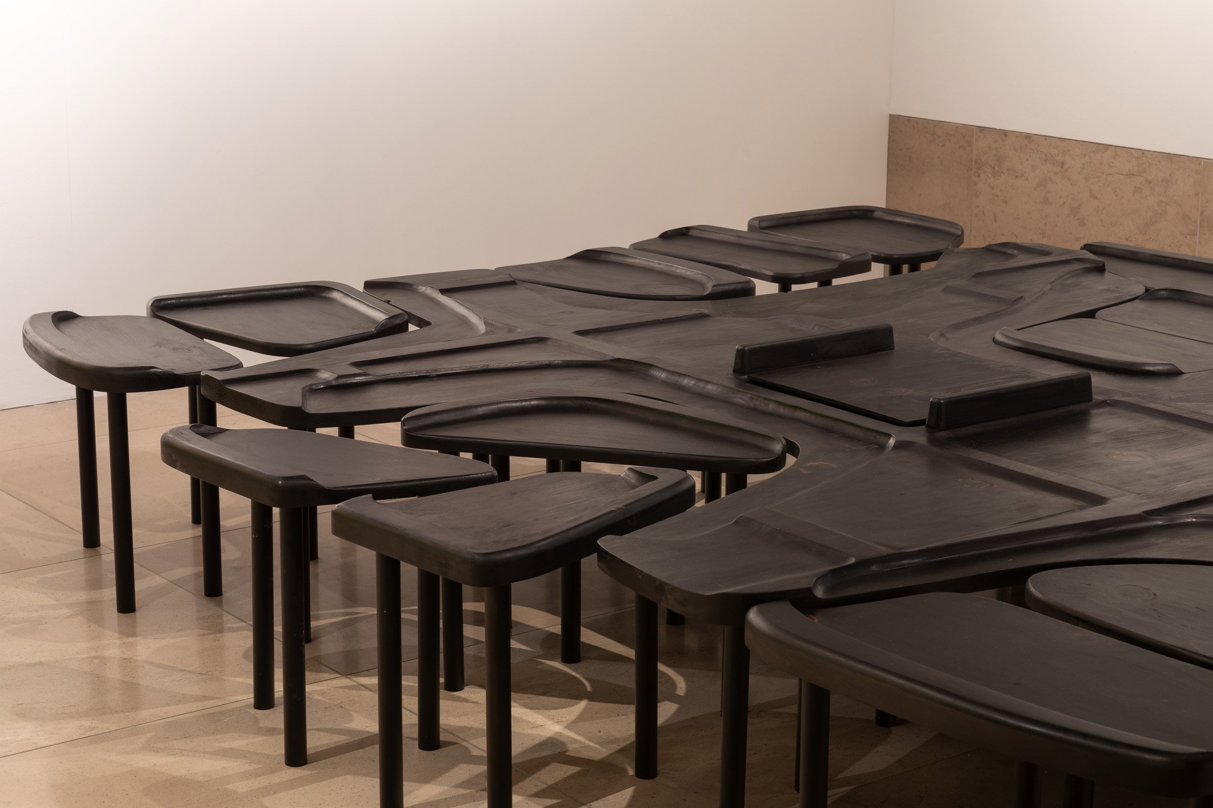 Wooden sculptures in Raise the Roof exhibition at RIBA in London