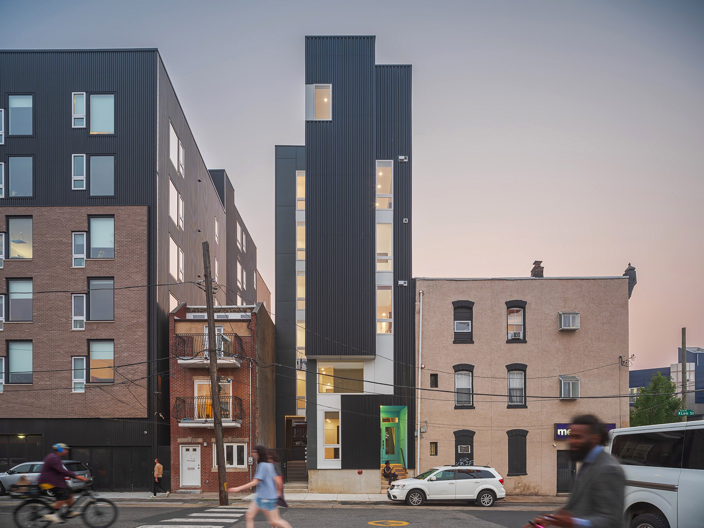 A slim building between two others