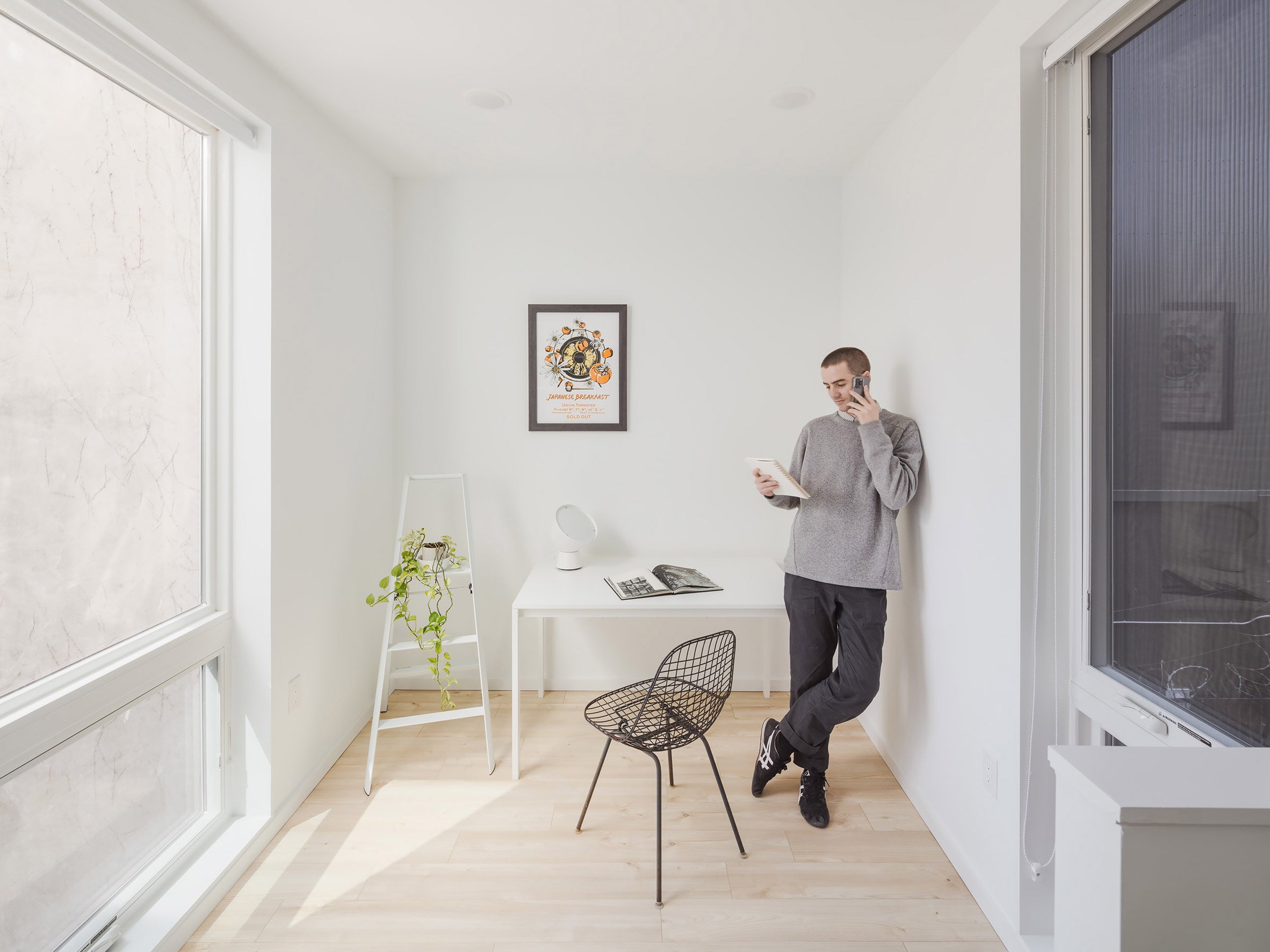 Person standing in white room