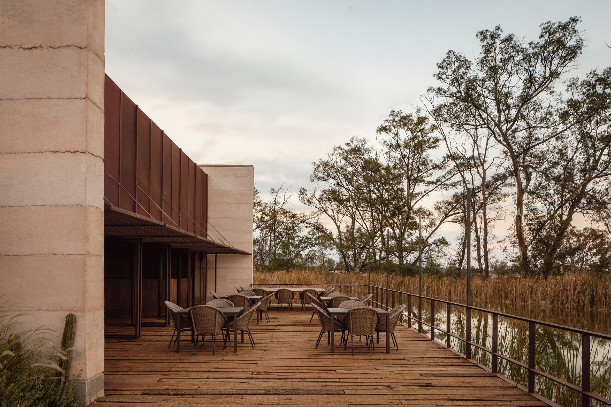 A deck with tables and chairs