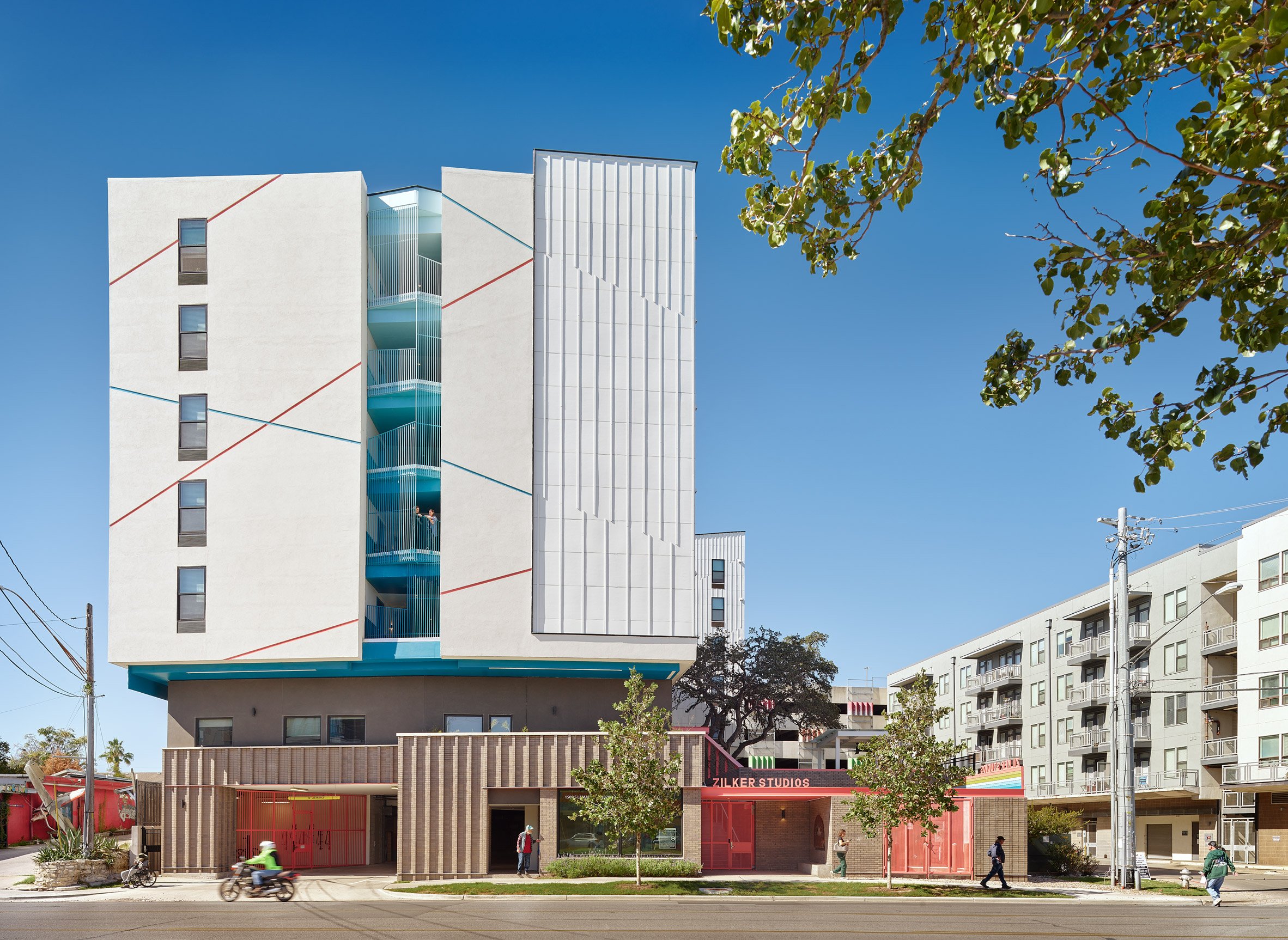 Austin housing block with blue balcony detail