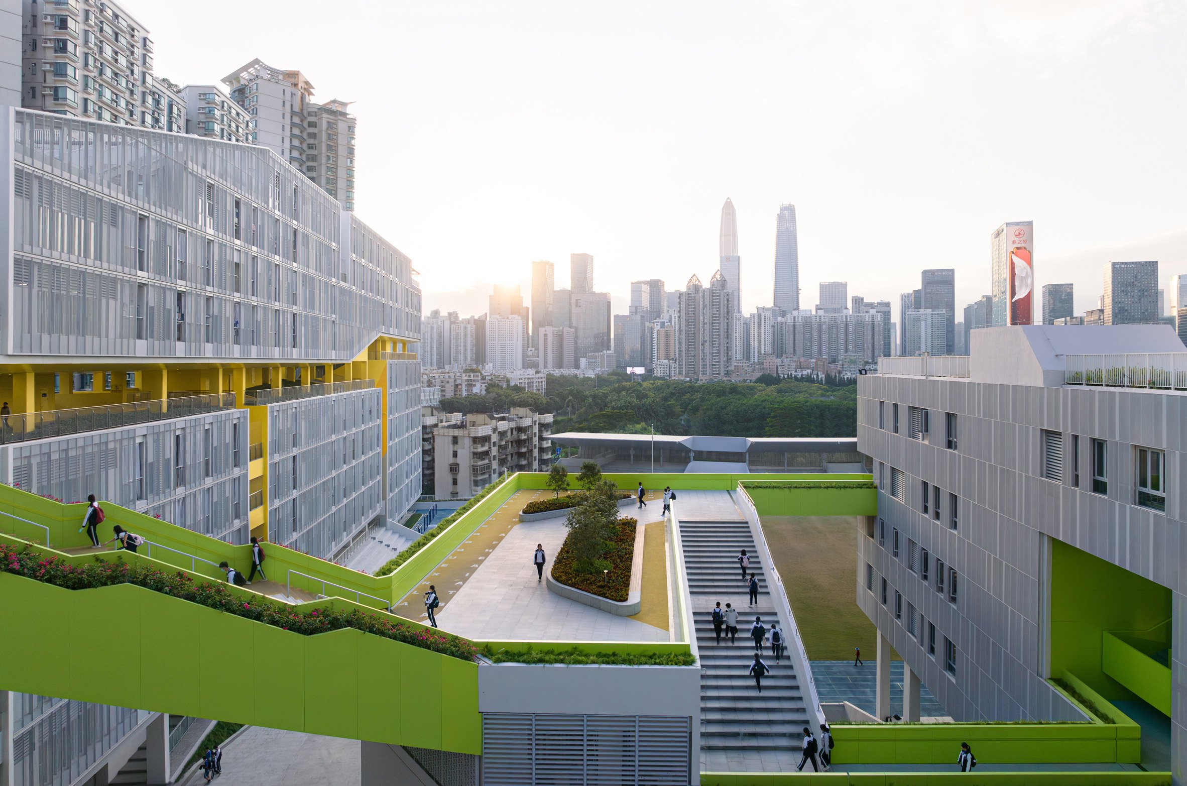 View of walkways at high school campus by Remix Studio