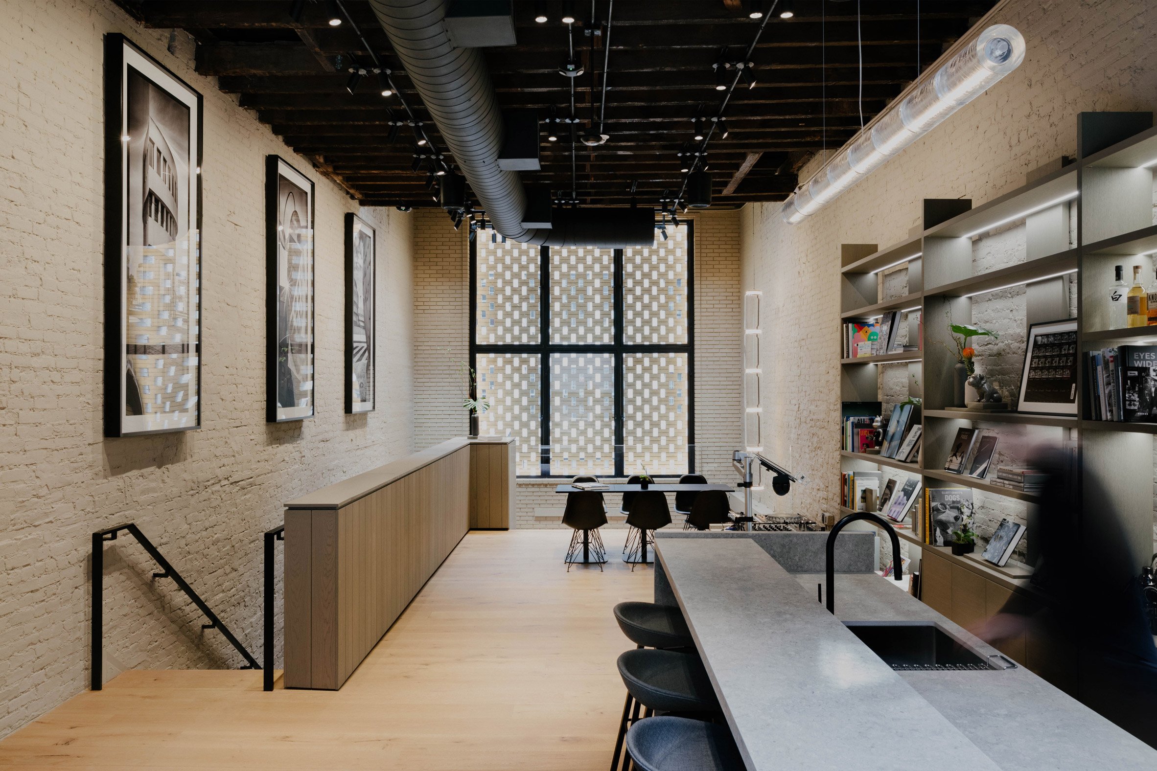 Studio space positioned behind a brickwork lattice