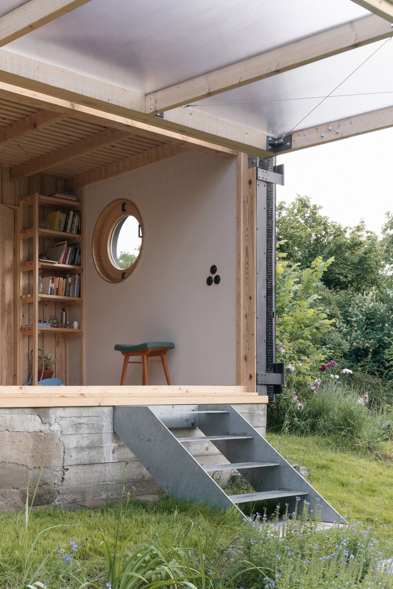 Wooden outbuilding in Prague with openable wall