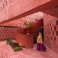Women climbing up the spiral steel staircase of the Zebun Nessa Mosque by Studio Morphogenesis in Bangladesh