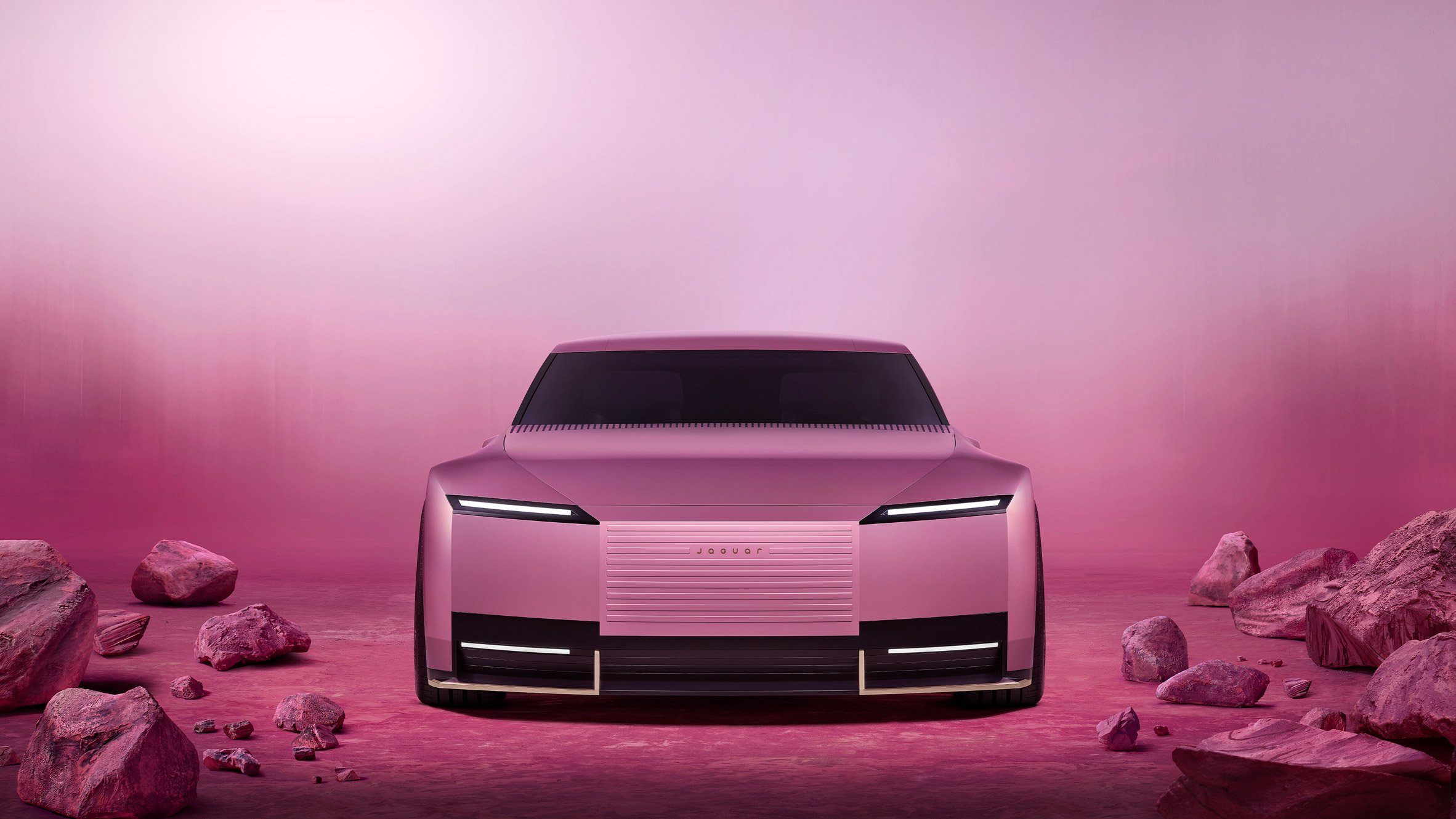 Rendering of the front of the Jaguar Type00 concept car in Miami Pink