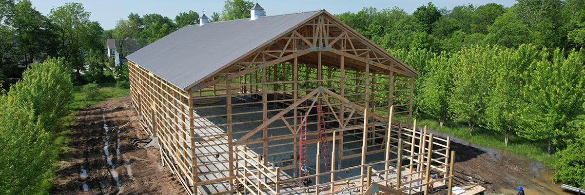 Spring vs Summer Build: What's Best for Your Pole Barn Project?