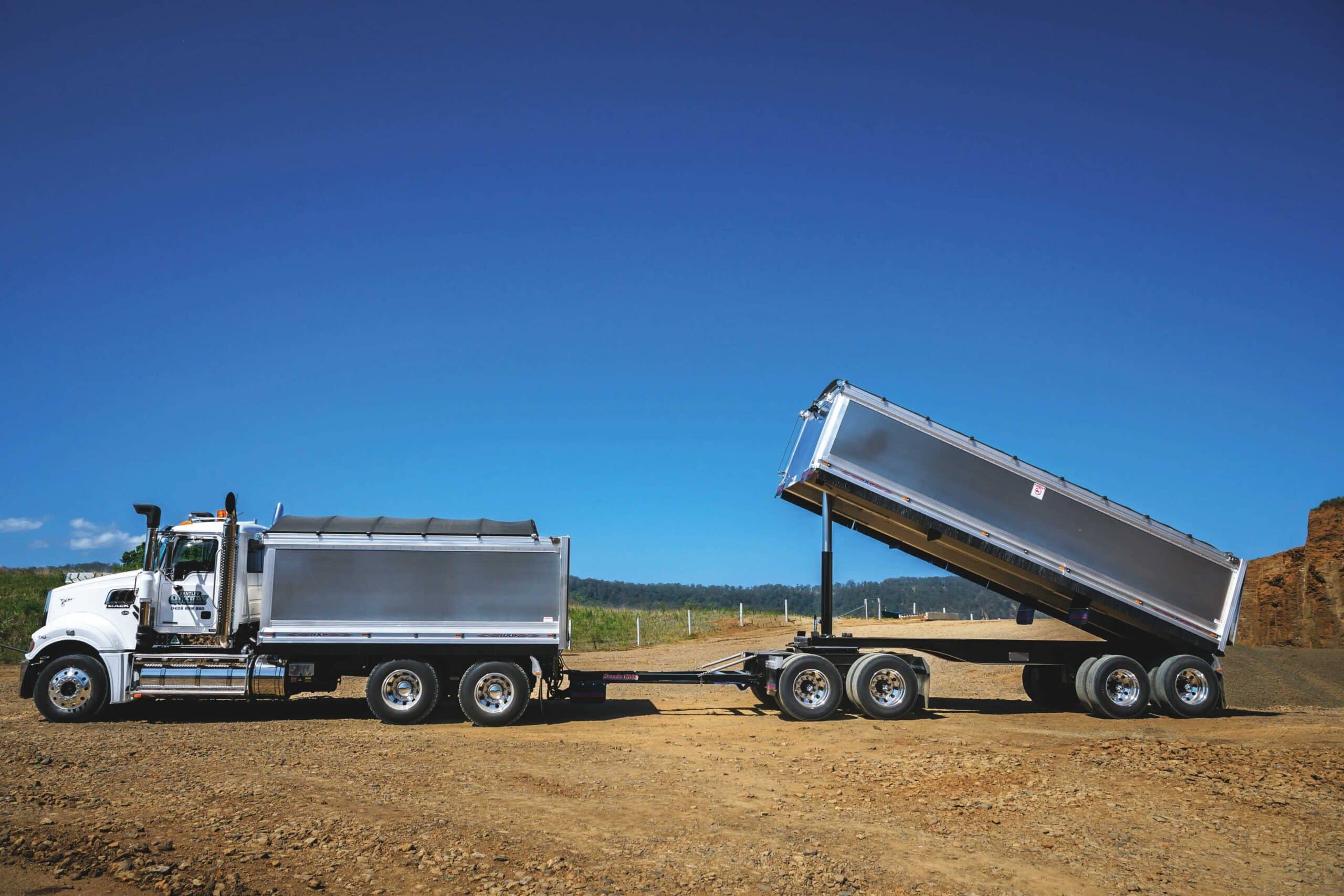 A Hamelex White Truck and Dog Tipper combination manufactured by Freighter Group.
