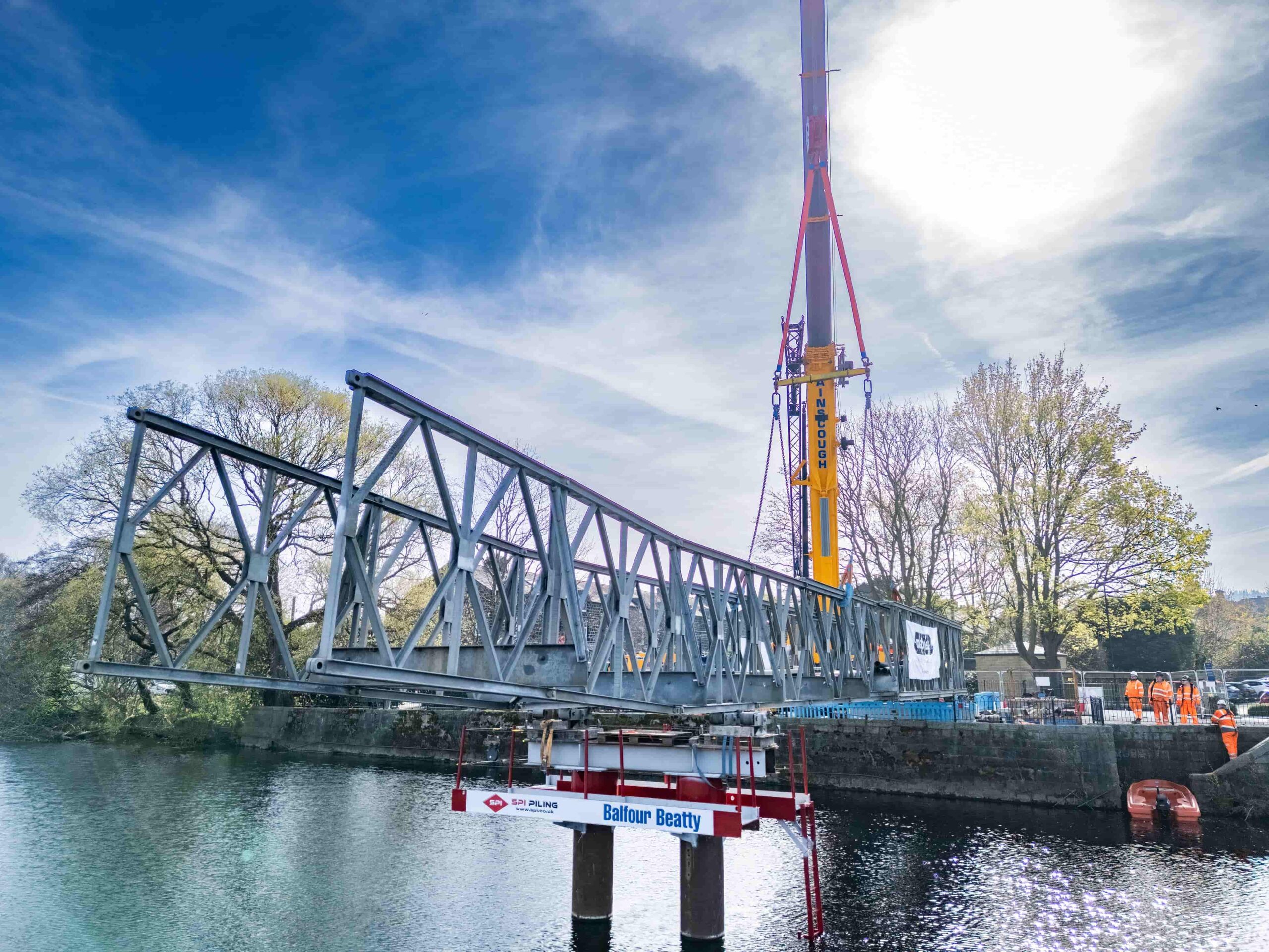 Balfour Beatty Otley Bridge - A temporary bridge structure being lifted by a crane - Mabey Hire designed a temporary bridge for Balfour Beatty during refurb works of Otley Bridge.