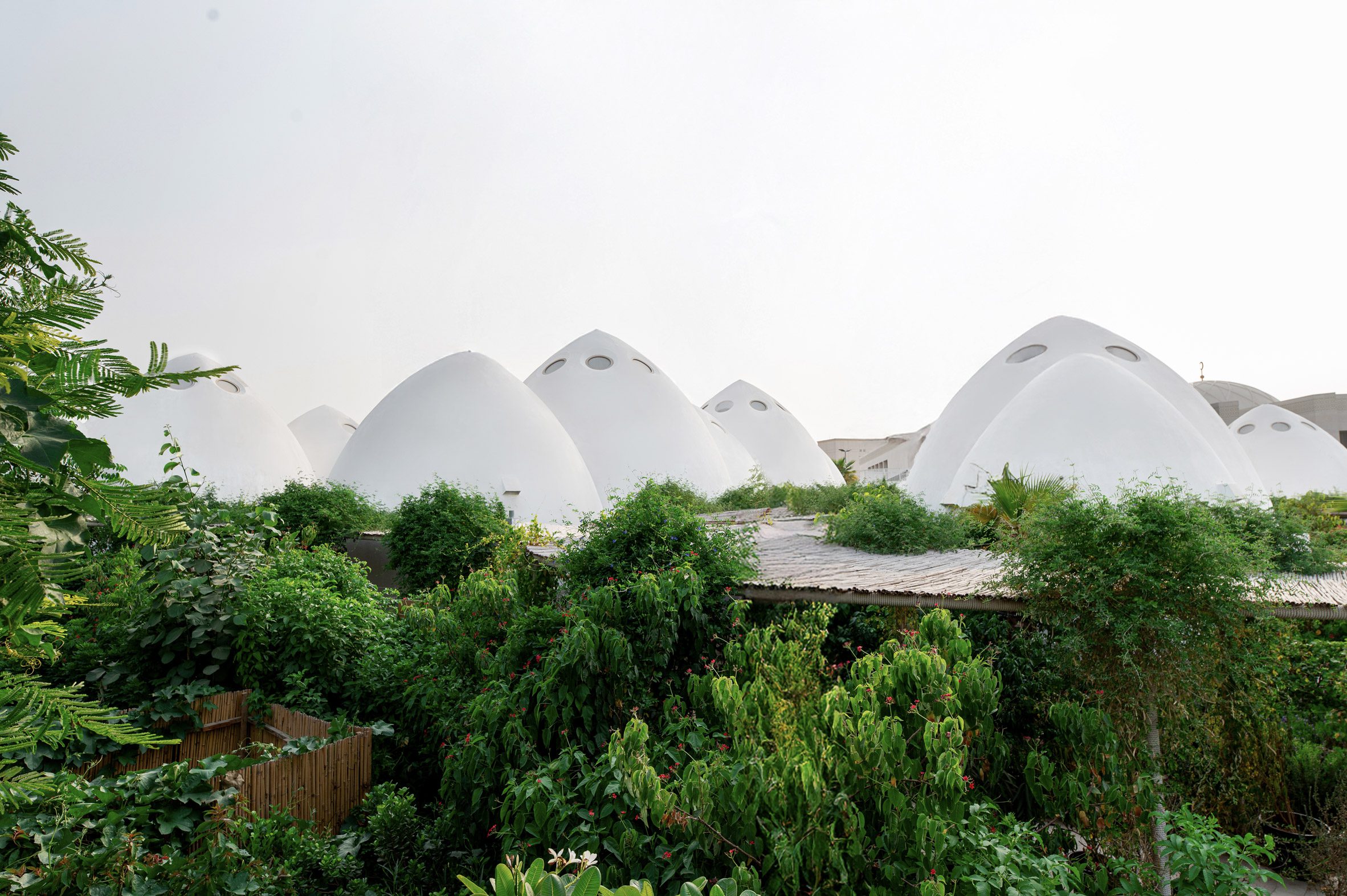 Concrete pointed-dome classrooms in Dubai by Emkaan