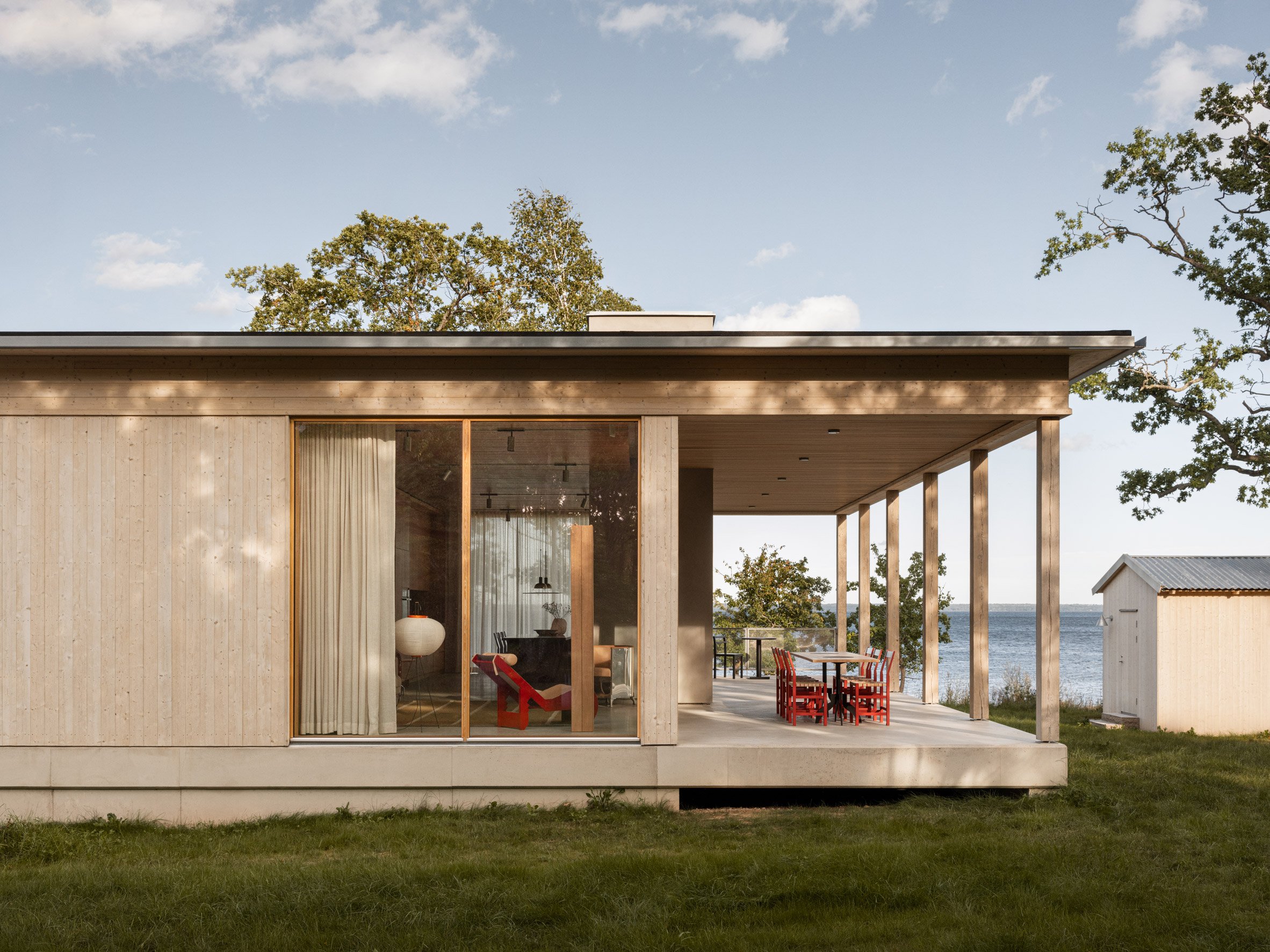 View towards coastal holiday home by Bross and Nick Flygt Arkitekter