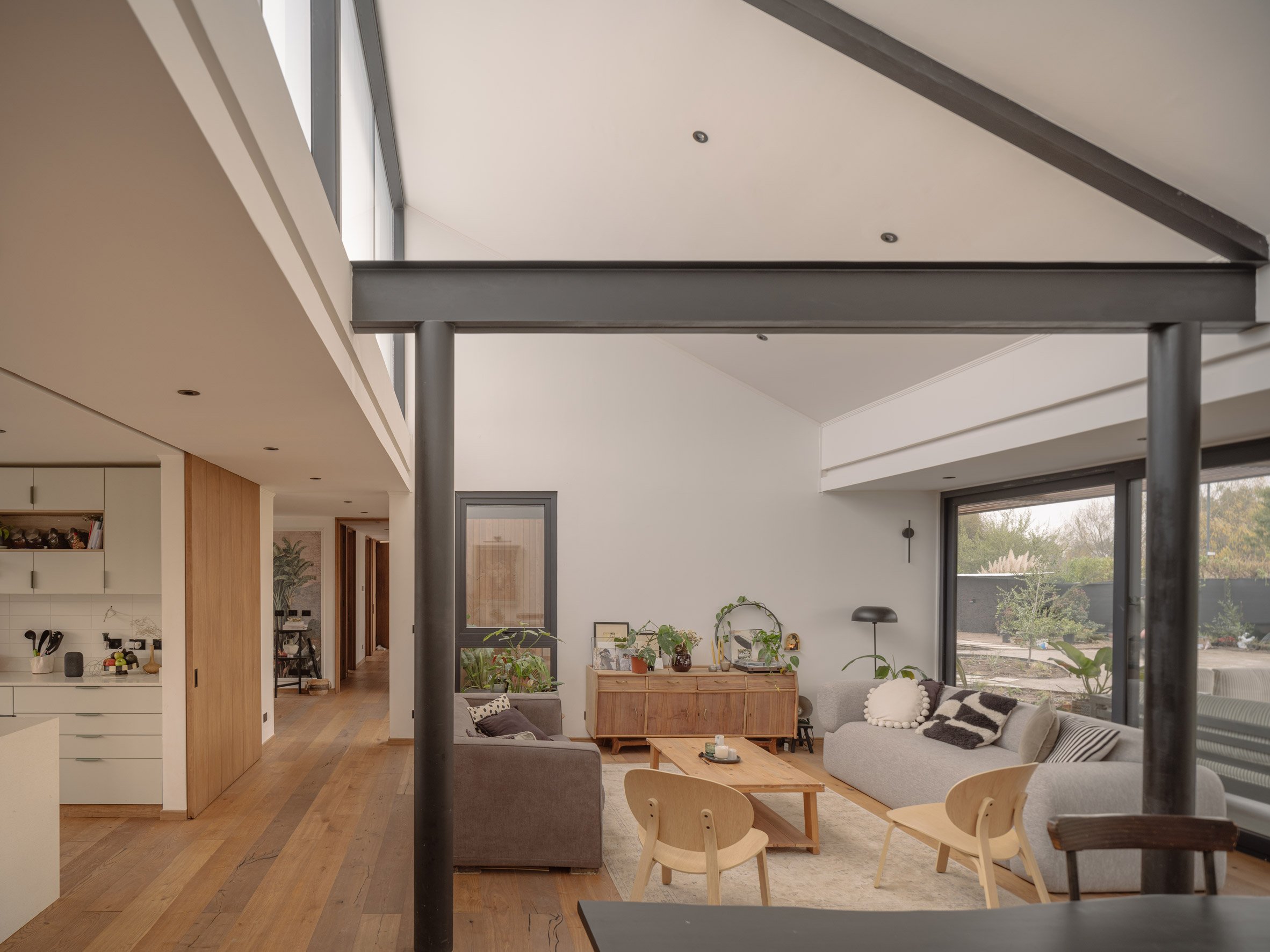 Steel truss in the middle of a living room