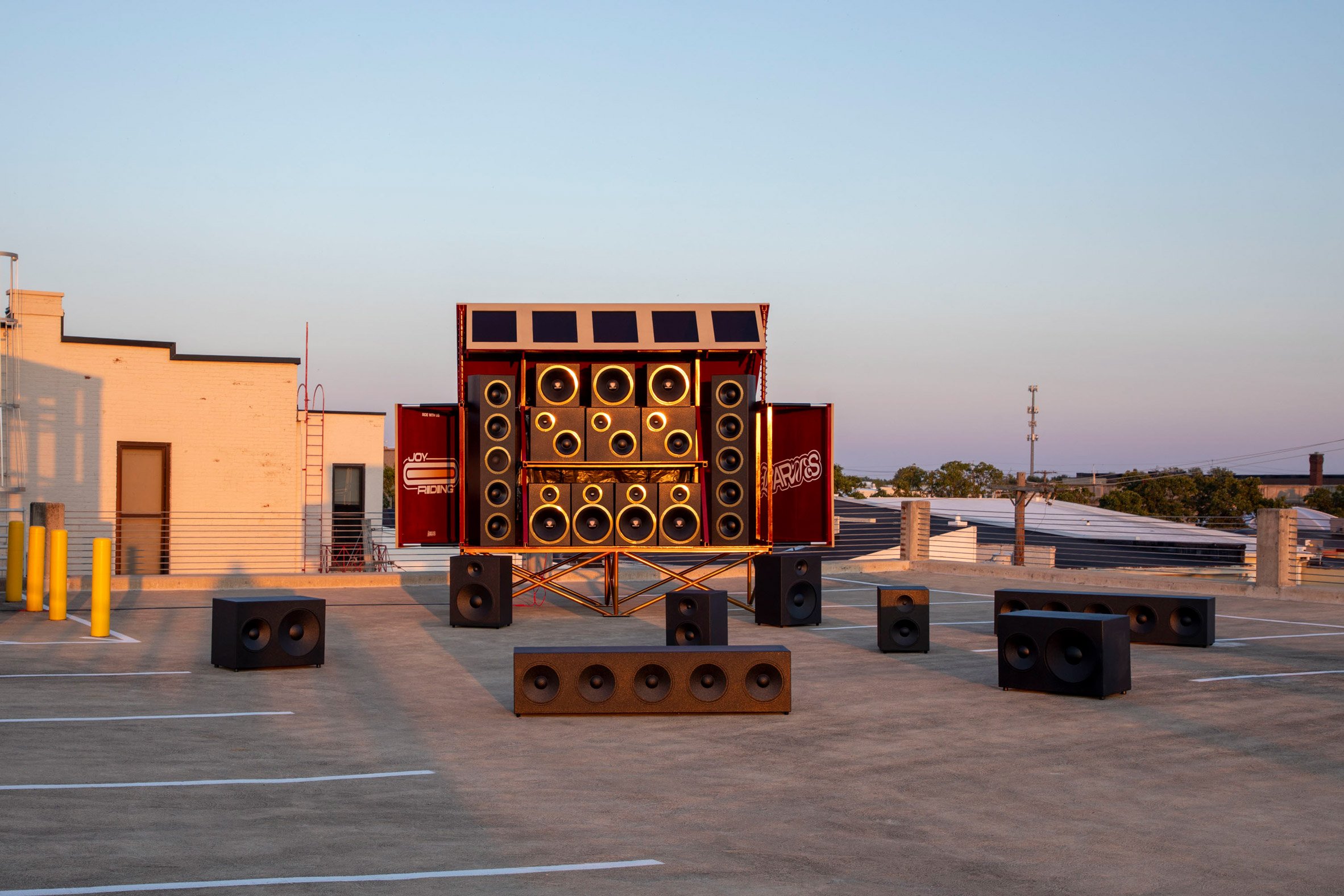Speaker on top of parking garage