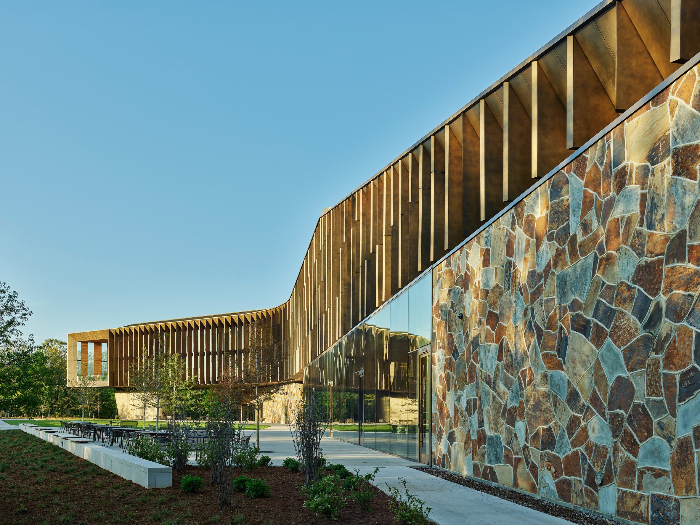 Building with stonework resembling a giraffe's hide