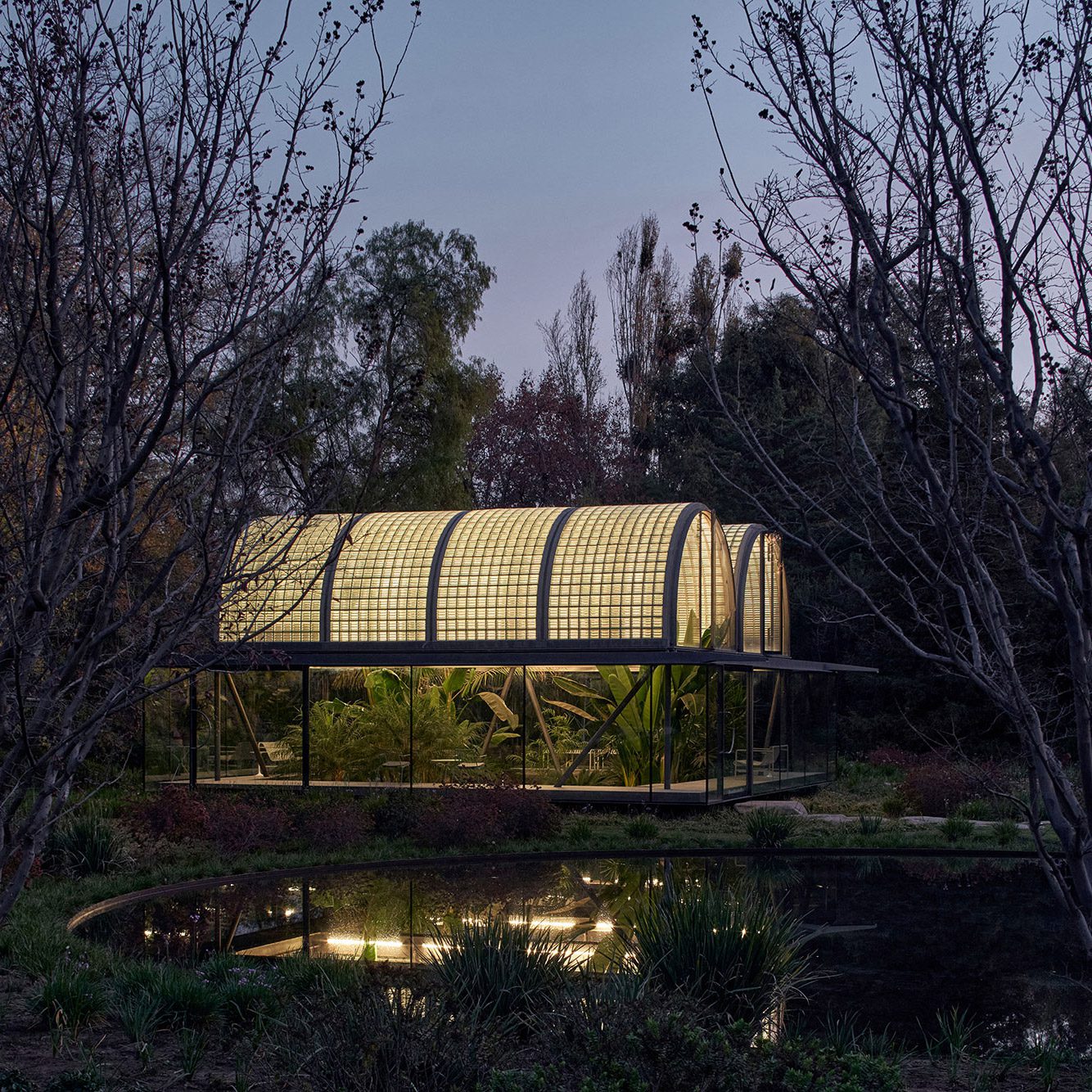 Glass-brick greenhouse at night