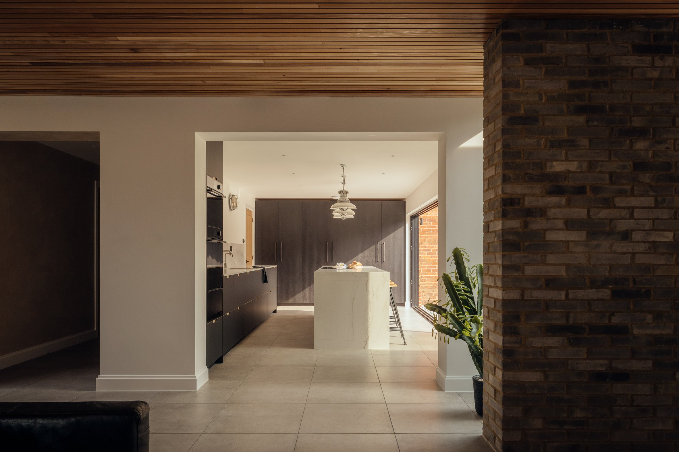 View of kitchen within residential extension by Neil Dusheiko Architects