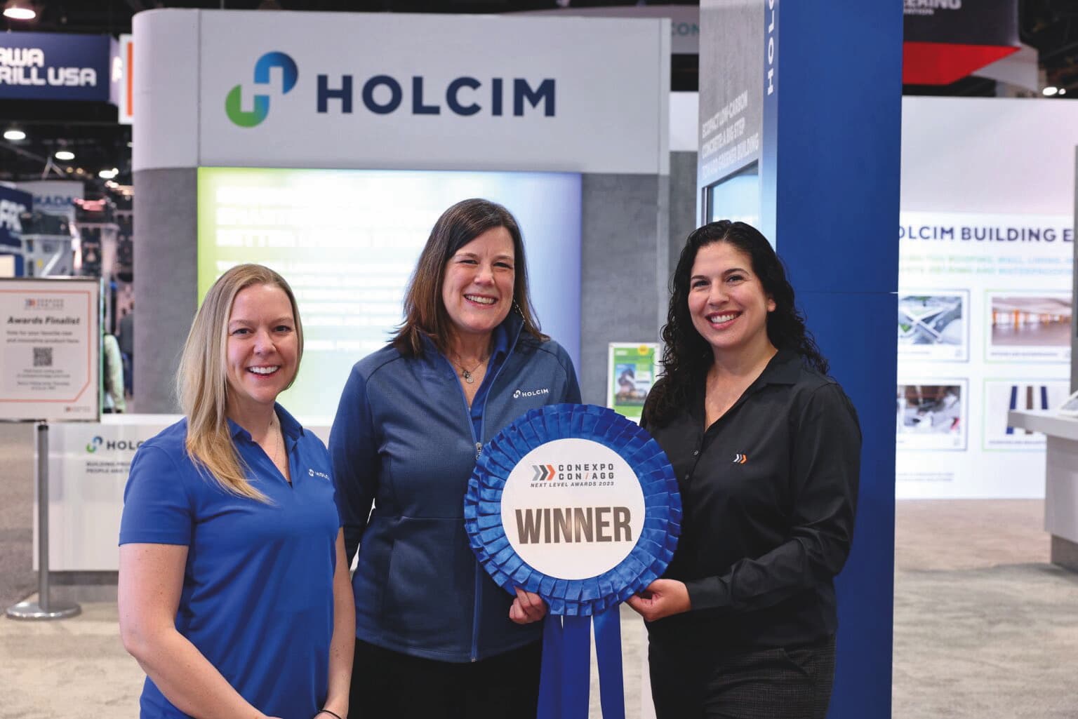Holcim accepted the Next Level Awards Contractors’ Choice Award during the 2023 CONEXPO-CON/AGG.
