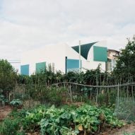 A House with an Inverted Roof by Fala Atelier