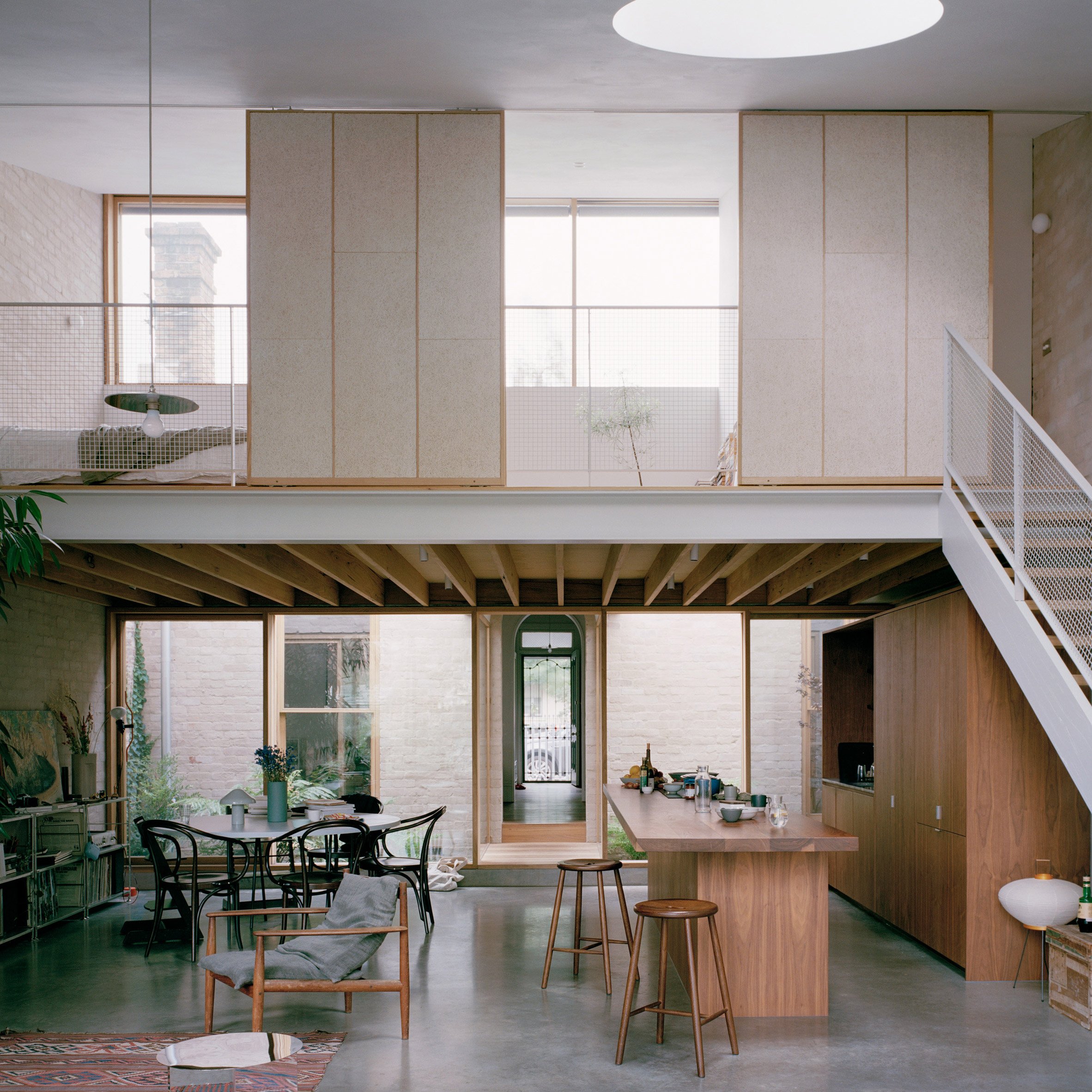 Cottage extension in Australia with sliding walls by Lovell Burton