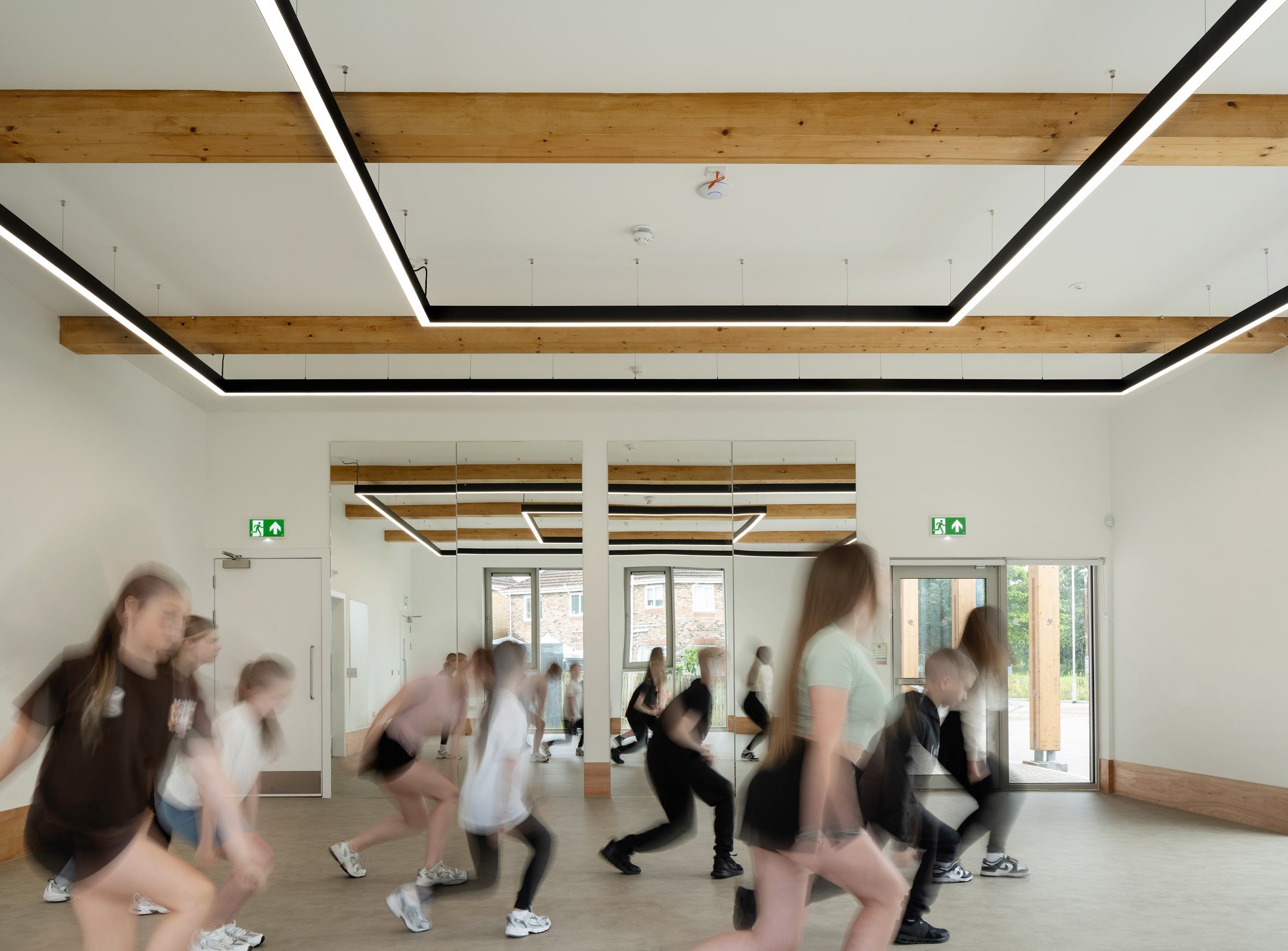 Dance class in community centre extension