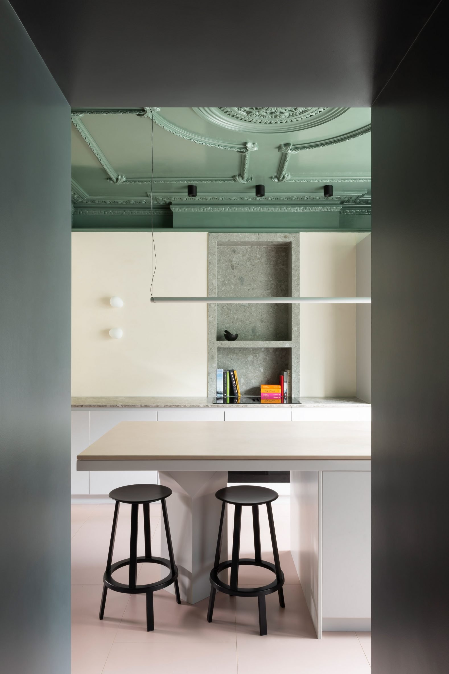 Kitchen with glossy green ceiling