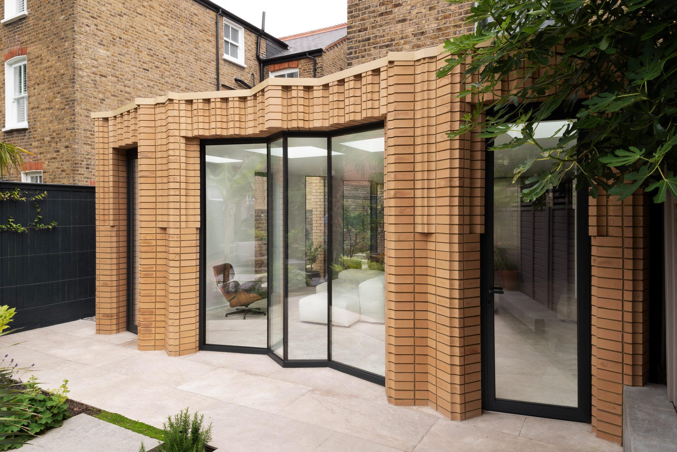 Brickwork extension with angular glazing