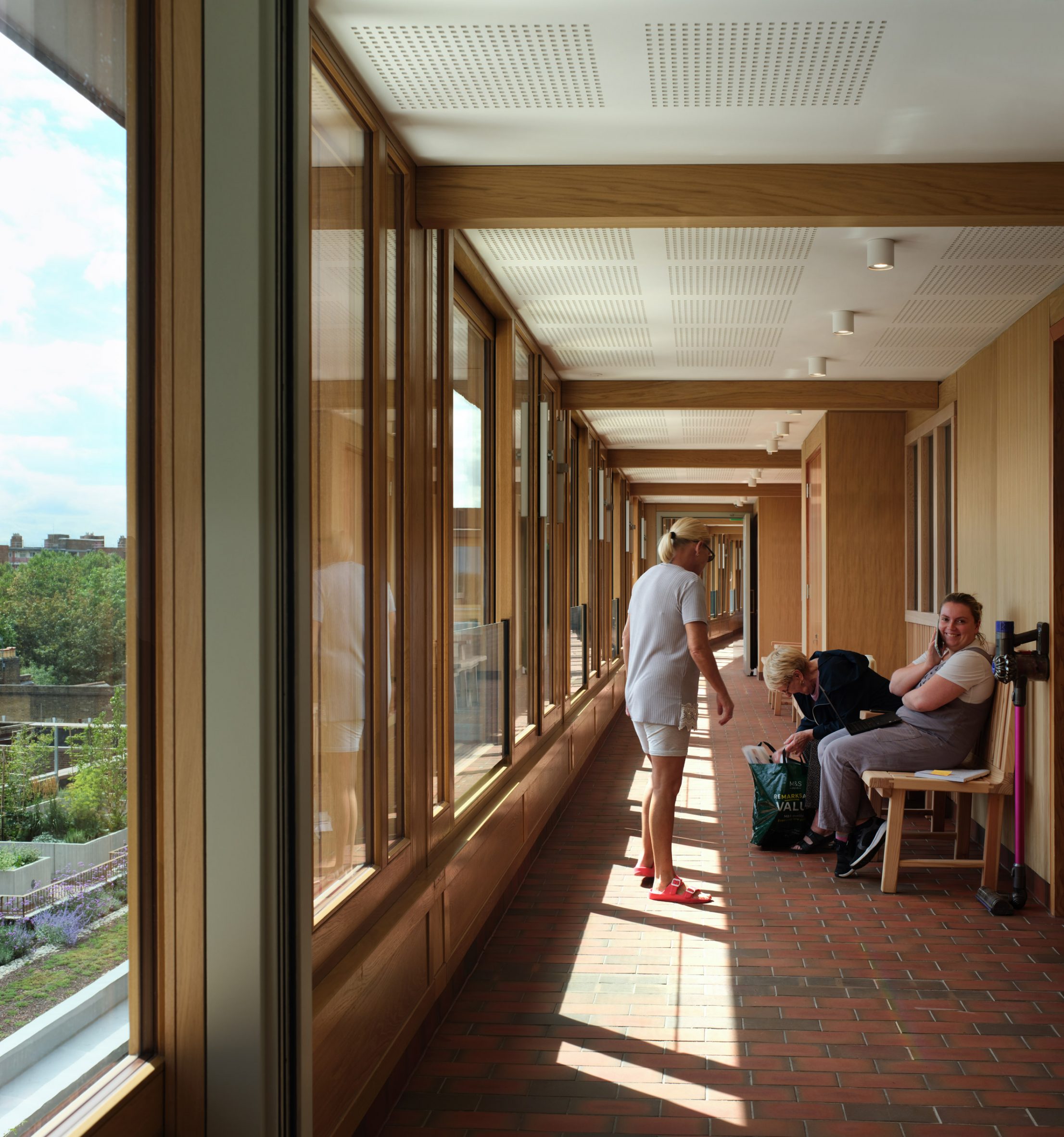 Internal corridor at RIBA Stirling Prize-winning Appleby Blue Almshouse by Witherford Watson Mann