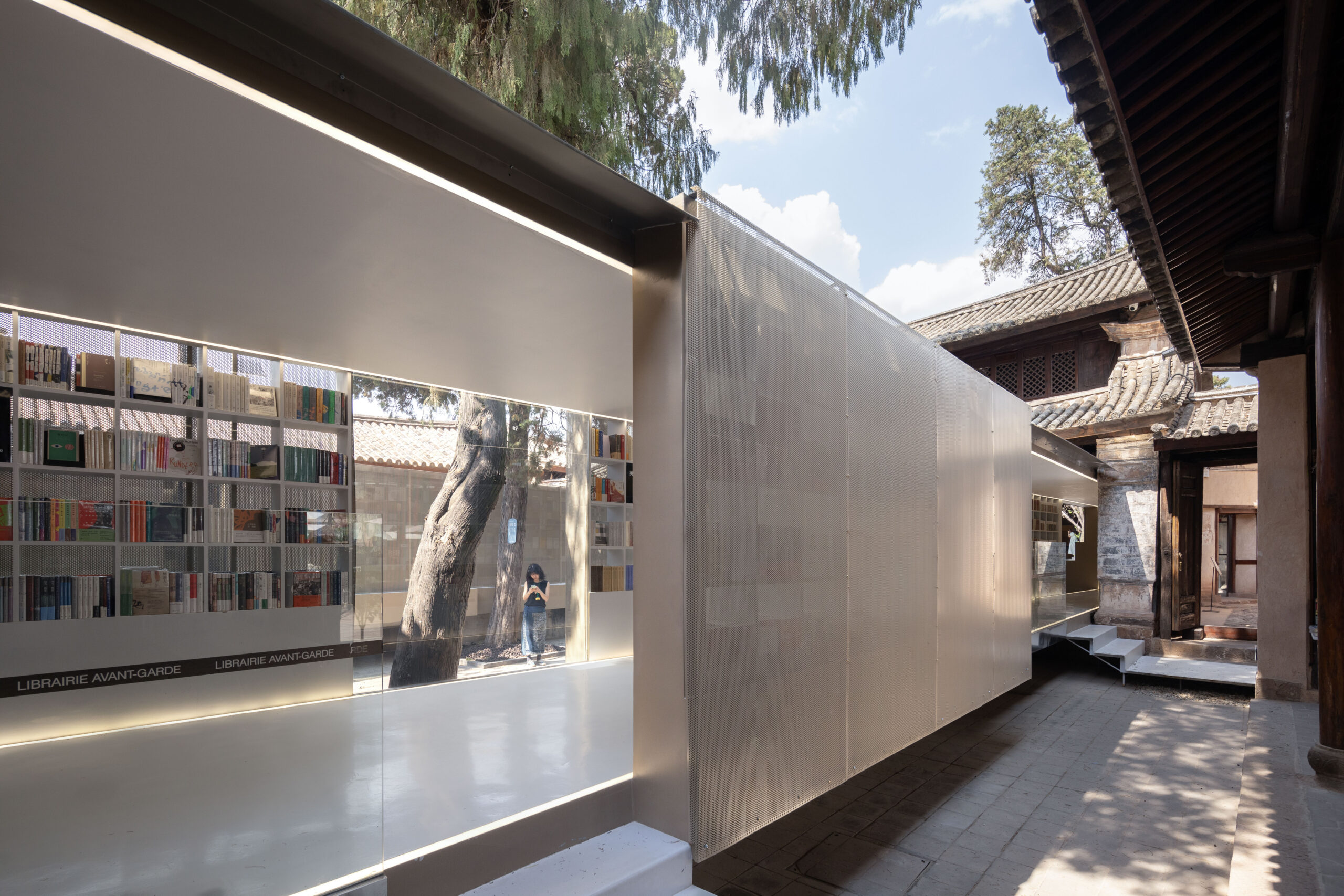 Adaptive reuse of historic Chongzheng Academy into a modern bookstore in Yunnan, China.