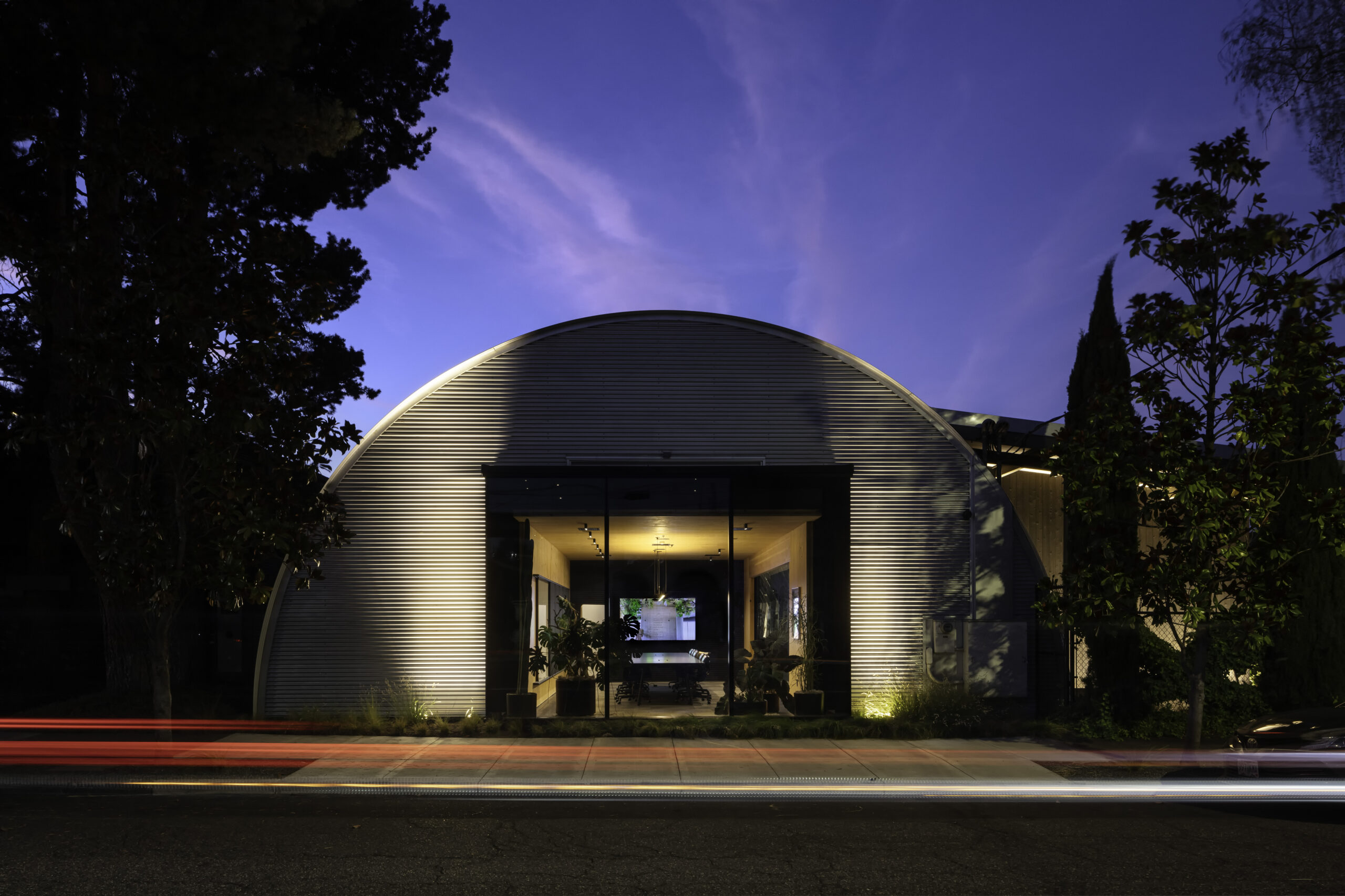 Exterior of Skylab HQ in Portland showing adaptive reuse of industrial steel warehouse buildings.