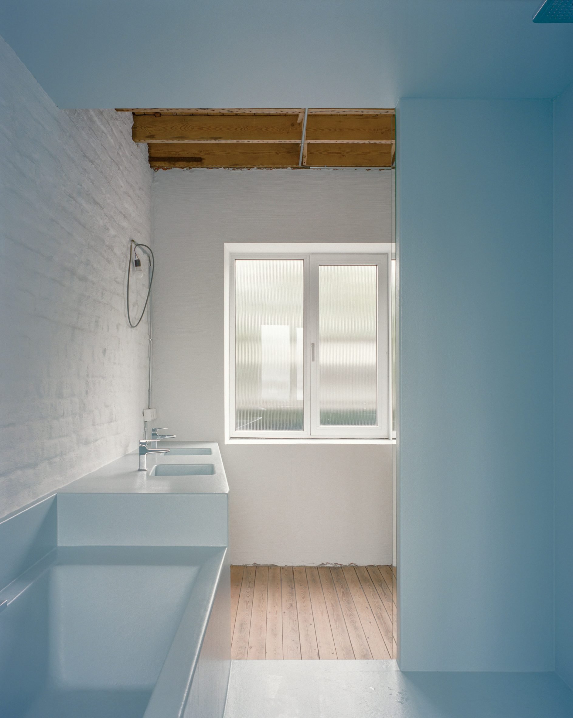 Interior view of home renovation by Atelier Avondzon and Macadam Atelier